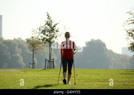 Delegate Tatiana Novaes at the annual INWA (International Nordic Walking Federation) convention in London's Hyde Park enjoying the unseasonably warm weather. Stock Photo