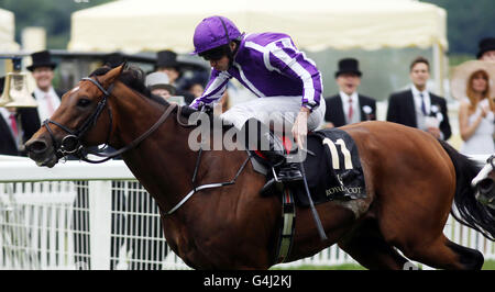 Sir Isaac Newton by Ryan Moore wins the Wolferton Handicap stakes during day five of Royal Ascot 2016, at Ascot Racecourse. Stock Photo