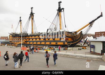 Admiral Lord Nelson's famous flagship HMS Victory stands minus her top-masts and bow-sprit at the Royal Navy Dockyard in Portsmouth. Stock Photo