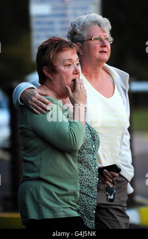 Two trapped in mine. Members of the public outside the Kellingley Colliery in Knottingley, where two miners were reported trapped. Stock Photo