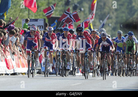 Great Britain's riders lead the pack in the Men's Road Race during Day Seven of the UCI Road Race World Championships, Copenhagen. Stock Photo