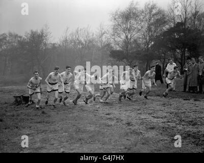 Athletics - Cross-Country - Inter-Varsity Oxford v Cambridge - London. The start of the Oxford v Cambridge Inter-Varsity Cross-Country Race held on Wimbledon Common. Oxford were the eventual winners. Stock Photo