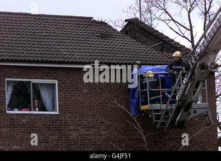 Bodies removed from house fire Stock Photo