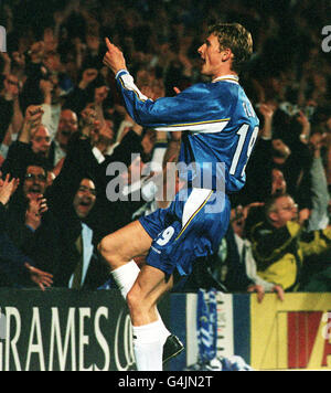 Chelsea's Tore Andre Flo celebrates with the fans after scoring the equalising goal during the European Cup Winners Cup semi-final 1st leg football match against Real Mallorca, at Stamford Bridge. Stock Photo