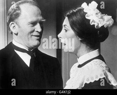 Actor Gordon Jackson, as butler Hudson and Jean Marsh as parlour maid Rose Buck in the British drama television series 'Upstairs, Downstairs' Stock Photo