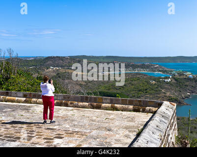dh Shirley Heights ANTIGUA CARIBBEAN Woman tourist viewpoint viewing island coast Stock Photo
