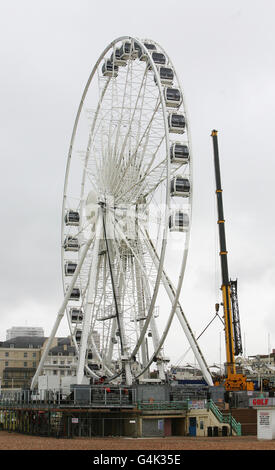 Construction gets under way on the eye-catching 170ft-high Ferris wheel dubbed the seaside version of the London Eye on Brighton beach in Sussex. Stock Photo