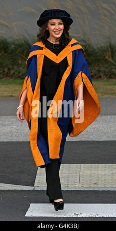 Singer Kylie Minogue arrives at Anglia Ruskin University before receiving an honorary degree in Chelmsford, Essex. Stock Photo