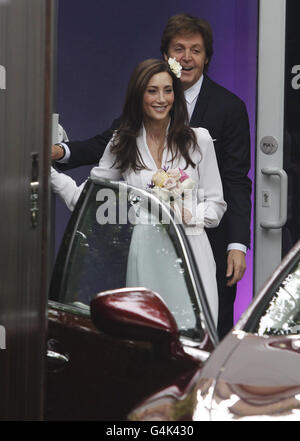 Nancy Shevell with Sir Paul McCartney leaving his house in north London to get married at Westminster Registry Office. Stock Photo