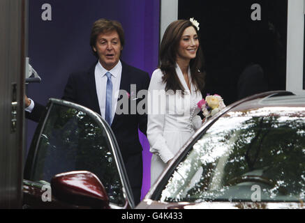 Nancy Shevell with Sir Paul McCartney leaving his house in north London to get married at Westminster Registry Office. Stock Photo