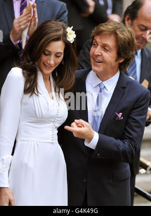 Sir Paul McCartney and Nancy Shevell leave Westminster Registry Office in north London after they got married. Stock Photo
