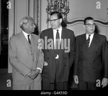 Reginald Maudling, Colonial Secretary, centre, with Norman Manley, Prime Minister of Jamaica, left, and Donald Sangster, Deputy Leader of the Opposition in Jamaica, at the opening of the Jamaica Constitutional Conference in London. Stock Photo