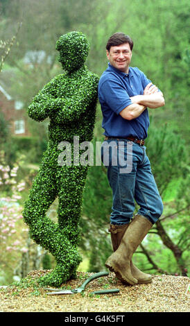 Alan Titchmarsh, the horticultural star turned green as he squared up to his doppelganger, specially created for the 'BBC Gardener's World Live Exhibition ' by designer Matthew Wurr. The exhibition takes place at the NEC Birmingham on 16th-20th June. * Alan, who also presents 'Ground Force' which is now the second highest rating BBC programme behind Eastenders, is seen here with his topiary double that was pruned to perfection Photo Martyn Hayhow Stock Photo