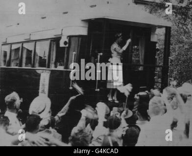 **Scanned low-res from contact** The Queen waves goodbye the the crowd in Hastings, New Zealand, during her tour of the Commonwealth Stock Photo