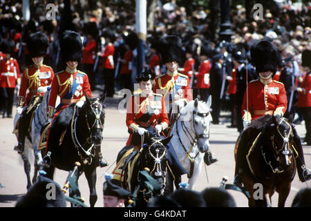 Queen Elizabeth II riding on her horse 'Burmese' during the Trooping of the Colour. Behind Her Majesty are the Royal Colonels of the Foot Guard Regiments; The Grenadier, Coldstream, Irish, Welsh and Scots Guard Regiments. Stock Photo