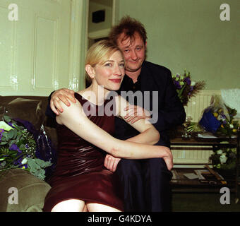 Oscar-nominated actress Cate Blanchett, with husband Andrew Upton, in her dressing room, after making her debut on the West End stage. Blanchett stars as highly-strung Susan Traherne in David Hare's Plenty at London's Albery Theatre. Stock Photo