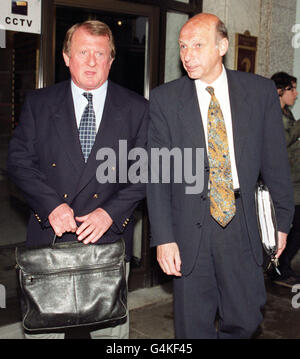 John Rudge (right), ex-manager of Port Vale FC, with John Barnwell of the League Managers Association, who was representing him at the Football League, in London. The League agreed Mr Rudge should be compensated for his dismissal from the First Division club. Stock Photo