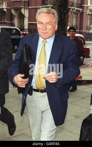 Bill Bell, chairman of Port Vale FC, leaves the Football League in London, where former manager John Rudge was awarded compensation for his dismissal from the club. Stock Photo