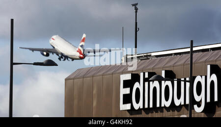 A British Airways aircraft takes off from Edinburgh Airport, following Airport operator BAA's announcement that it is to sell Edinburgh airport. Stock Photo