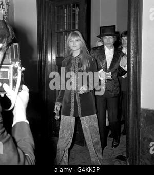 Pop star Mick Jagger of the Rolling Stones and his friend, singer Marianne Faithfull, arrive at the Royal Opera House in Covent Garden, London, for a Royal Ballet Gala Performance. Stock Photo