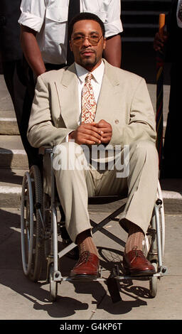 Former boxer Michael Watson, who has been left permanently disabled after a fight with Chris Eubank in 1991, in a wheelchair outside the High Court in London, where he launched an action for compensation against the British Boxing Board of Control. *8/6/99: Three appeal judges were giving judgment on an appeal by the British Boxing Board of Control against a High Court decision in a 1 million damages action that it was liable for Watson's injuries. In a case of vital importance to other sporting bodies, the BBBC, which went into administrative receivership after the High Court ruling, has Stock Photo