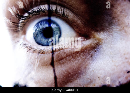 Intense close-up of an eyeball. Reminiscent of a horror film... Stock Photo