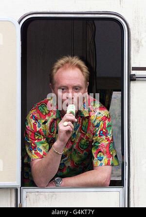 Actor Bruce Jones, who plays Les Battersby, waves during filming of 'Coronation Street' in north Wales. In the episode, the Platt's peaceful caravan holiday break is ruined by the unexpected arrival of their nuisance neighbours, the Battersbys. Stock Photo