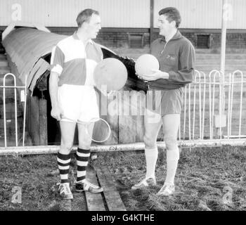 Comedian Stan Stennett (left) gets some advice from Trevor Ford, the former Welsh international centre-forward who now plays for Newport County, when he turns out for some football training at County's ground, Somerton Park. Stock Photo