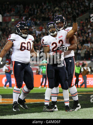 Chicago Bears Matt Forte celebrates scoring a touchdown during the NFL  International Series Match at Wembley, London Stock Photo - Alamy