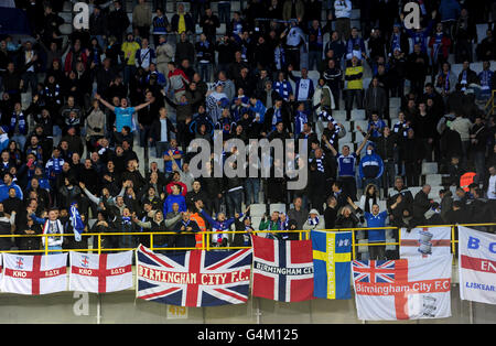 Club Brugge fans in the stands celebrate the result after the