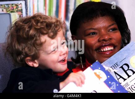Former TV Gladiator Judy Simpson braved her heartache at losing her eight-month-old daughter to meningitis, to launch the Bookstart Scheme in Birmingham, marking her first public appearance since the death of baby Joan Mary five months ago. * Picture shows: Judy with 2-year-old Ben Priestley from Hall Green. Stock Photo