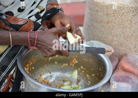 Mumbai, India - October 26, 2015 - Indian food charmuri prepared by woman in Mumbai Stock Photo