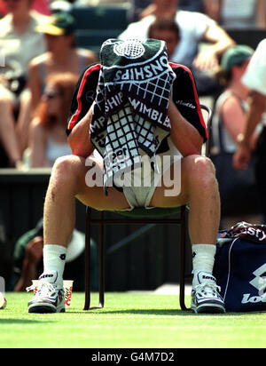 No commercial use. Germany's Boris Becker in action during his match with Australian Lleyton Hewitt, at the 1999 Wimbledon tennis Championships. Stock Photo