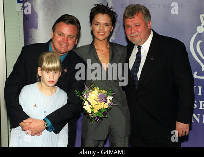 - . Spice Girl Victoria Adams, a patron of the Meningitis Research Foundation, with comedians Norman Pace (left), Gareth Hale and Norman's 11 year-old daughter Holly, to launch the Be Free of Meningitis appeal. *At the ITN headquarters in London. Posh Spice. Stock Photo