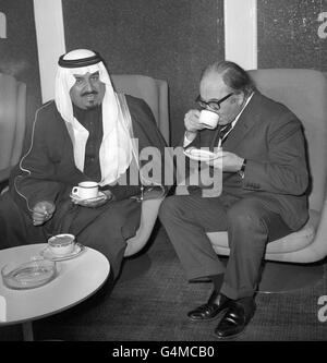 Amir Sultan bin Abdul Aziz, Saudi Arabia's Defence and Aviation Minister being greeted by Fred Mulley, right, Britain's Defence Minister, at Heathrow Airport. Stock Photo