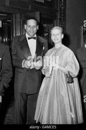 Latin-American band-leader, Edmundo Ros, with his wife Britt Johansen, attend the premiere of the film 'The Diary of Anne Frank.' Stock Photo