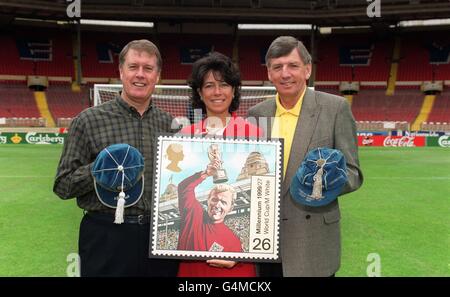 (L-R) Sir Geoff Hurst, Stephanie Moore and Martin Peters at Wembley Stadium, London, to unveil the latest Royal Mail Millennium Stamp. The stamp pays tribute to the late Bobby Moore and England's historic World Cup victory in 1966. * The stamp features an illustration of the then England captain, Bobby Moore holding aloft the Jules Rimet Trophy at Wembley Stadium when England won the World Cup. Stock Photo