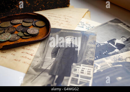 Old b&w photos, a coin pouch and yellowed love letters from 1944, found in an attic in Estonia in 2016 Stock Photo