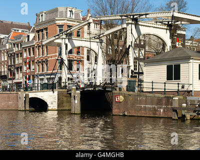 A view along one of Amsterdam's many canals on a beautiful spring day. Stock Photo