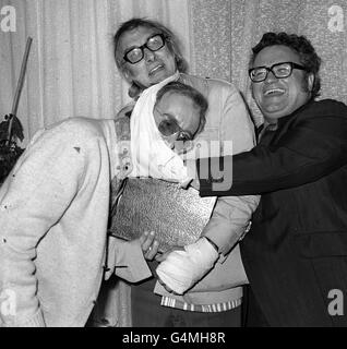 Goons (L-R) Peter Sellers, Spike Milligan and Harry Secombe at a London reception to launch the book 'The Goon Show Scripts', which contains original scripts of the radio series and drawing by all three Goons. *27/02/02: Spike Milligan died early today at his home in Sussex, his agent said. Stock Photo