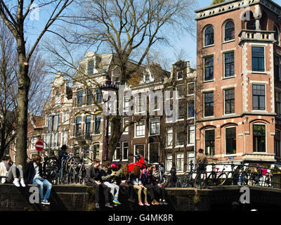 A view along one of Amsterdam's many canals on a beautiful spring day. Stock Photo