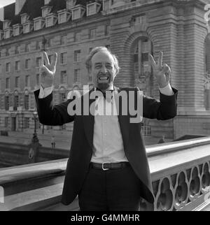 Enjoying the sweet smell of success, Mr Horace Cutler, the new Tory leader of the Greater London Council gestures his approval at County Hall after the Conservatives had scored a landslide victory over Labour in the county council elections. Stock Photo