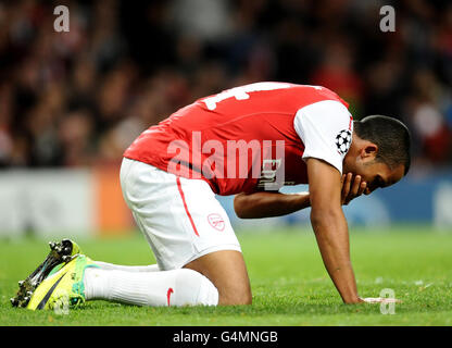 Soccer - UEFA Champions League - Group F - Arsenal v Marseille - Emirates Stadium. Arsenal's Theo Walcott recovers from a knock during a UEFA Champions League Group F match at the Emirates Stadium, London. Stock Photo