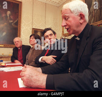 Library file, dated 17/12/97. Cardinal Basil Hume addresses a meeting of religious leaders to launch the Mauritius Mandate, a five point plan to resolve the debt problems of poor countries, at the office of the Chancellor of the Exchequer, in Downing Street today (Wed). From left: Archbishop of Canterbury Dr George Carey, International Development Secretary Clare Short, Chancellor Gordon Brown and Archishop of Westminster Cardinal Hume: Cardinal Hume, leader of Roman Catholics in England and Wales, died today (Thursday June 17, 1999), aged 76. See PA story DEATH Hume Stock Photo
