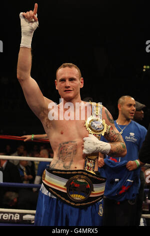 George Groves celebrates his victory over Paul Smith during the British and Commonwealth Super-middleweight Title fight at Wembley Arena, London. Stock Photo