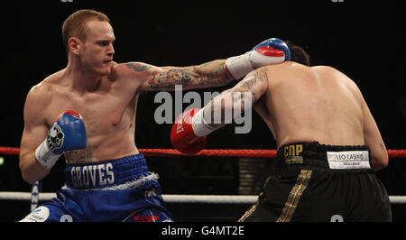 George Groves' (left) on his way to second round knockout over Liverpool's Paul Smith during the British and Commonwealth Super-middleweight Title fight at Wembley Arena, London. Stock Photo