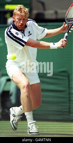 No commercial use. Germany's Boris Becker in action during his match with Australian Lleyton Hewitt, at the 1999 Wimbledon tennis Championships. Stock Photo