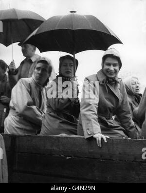 Queen Elizabeth II, right, with her sister Princess Margaret and her husband Antony Armstrong-Jones at the British Horse Society's three day horse trials. Stock Photo