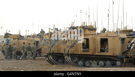 Soldiers from D Squadron Royal Scots Dragoon Guards manning the 'Warthogs' all-terrain vehicles in Camp Bastion, Afghanistan. Stock Photo