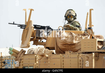 Soldiers from D Squadron Royal Scots Dragoon Guards manning the 'Warthogs' all-terrain vehicles in Camp Bastion, Afghanistan. Stock Photo